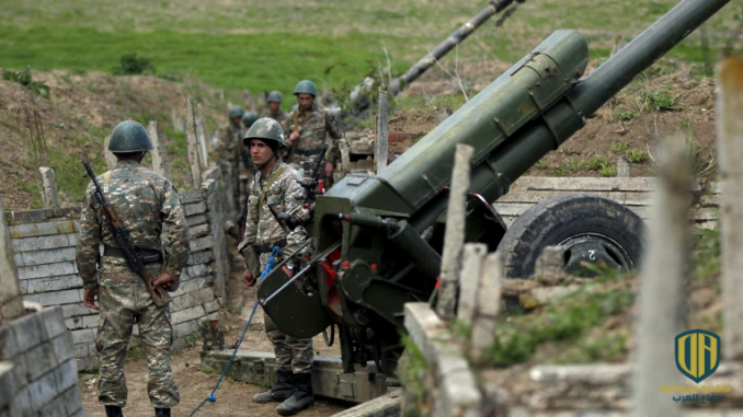 جنود أرمنيون في أحد مواقع المدفعية بإقليم ناغورني قره باغ (رويترز-أرشيف)