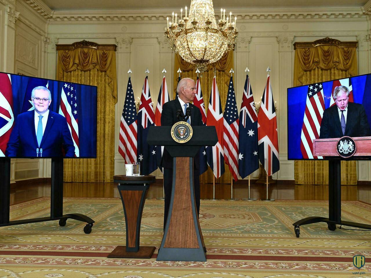 الرئيس الأميركي جو بايدن خلال مؤتمر عبر الفيديو مع رئيسي الوزراء البريطاني بوريس جونسون والأسترالي سكوت موريسون